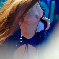 Beautiful beach girl changing