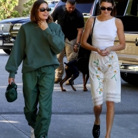 Hailey Bieber with Kendall Jenner showing her braless boobs and pokies in a white top at the Beverly Grill in Beverly Hills 04.jpg