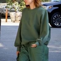 Hailey Bieber with Kendall Jenner showing her braless boobs and pokies in a white top at the Beverly Grill in Beverly Hills 08.jpg