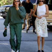 Hailey Bieber with Kendall Jenner showing her braless boobs and pokies in a white top at the Beverly Grill in Beverly Hills 09.jpg