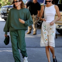 Hailey Bieber with Kendall Jenner showing her braless boobs and pokies in a white top at the Beverly Grill in Beverly Hills 10.jpg