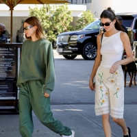 Hailey Bieber with Kendall Jenner showing her braless boobs and pokies in a white top at the Beverly Grill in Beverly Hills 11.jpg