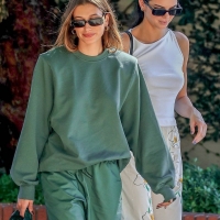 Hailey Bieber with Kendall Jenner showing her braless boobs and pokies in a white top at the Beverly Grill in Beverly Hills 16.jpg