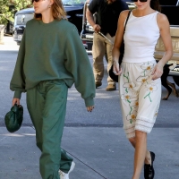 Hailey Bieber with Kendall Jenner showing her braless boobs and pokies in a white top at the Beverly Grill in Beverly Hills 17.jpg