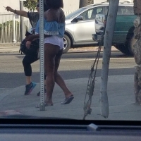 Candid thick black prostitute showing her cheeks in little shorts on the street tumblr_p0o0e284T91w1efffo2_1280.jpg