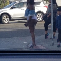 Candid thick black prostitute showing her cheeks in little shorts on the street tumblr_p0o0e284T91w1efffo1_1280.jpg