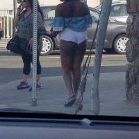 Candid thick black prostitute showing her cheeks in little shorts on the street tumblr_p0o0e284T91w1efffo4_1280.jpg