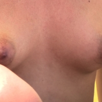 Beautiful candid topless blonde at the beach with cute tits and puffy nipples up-close-and-personal-28-113.jpg