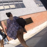 Wind helps to give a peek of a sexy brunette girls ass and thong panties under her skirt Omega Wind.mp4-2022-11-27-10h30m30s643.jpg