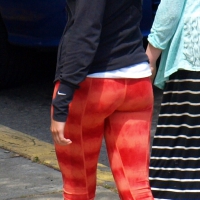 Brunette in patterned leggings