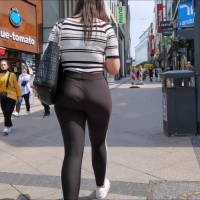 Brunette girl in Adidas leggings