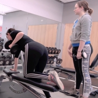 Two college girls working out