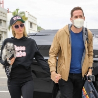 Paris Hilton in leggings with Carter Reum at the airport 18.jpg