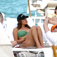 Anastasia Karanikolaou shows off her beach body in a green bikini while chilling with friends in Miami 10.jpg