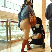 Ebony milf in a tight skirt