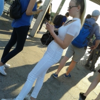 Skinny blonde in white jeans
