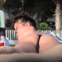 Two topless pals at the beach relaxing while showing their nice boobs hotties-two-pals-120.jpg