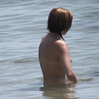 Topless chick with her tits floating above the shallow waters in-the-shallows-104.jpg