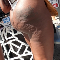 Candid ebony party chick with a sexy big tattooed booty in a white thong swimsuit chocolate thickness in thong.mov-2024-12-08-14h38m56s225.jpg