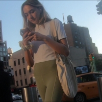 Cute blonde in green leggings