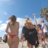 Smoking hot candid beach girl with an awesome ass in a tiny red thong bikini VideoToPhoto 637639062402915211.jpg