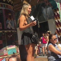 Candid blonde in short skirt