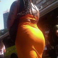 Candid ebony babe with a big booty in a tight orange dress orange.mp4-2022-12-22-15h27m27s217.jpg