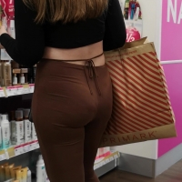 Hot candid babe shopping with a nice ass and vtl in brown flared leggings Boots babe in brown trousers.mp4-2021-12-26-08h41m21s614.jpg