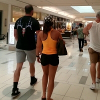 Candid fit babe at the mall in spandex shorts and an orange top Fit Chick Shorts.mp4-2021-12-29-17h21m53s779.jpg