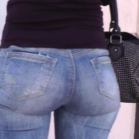 Short haired girl in jeans
